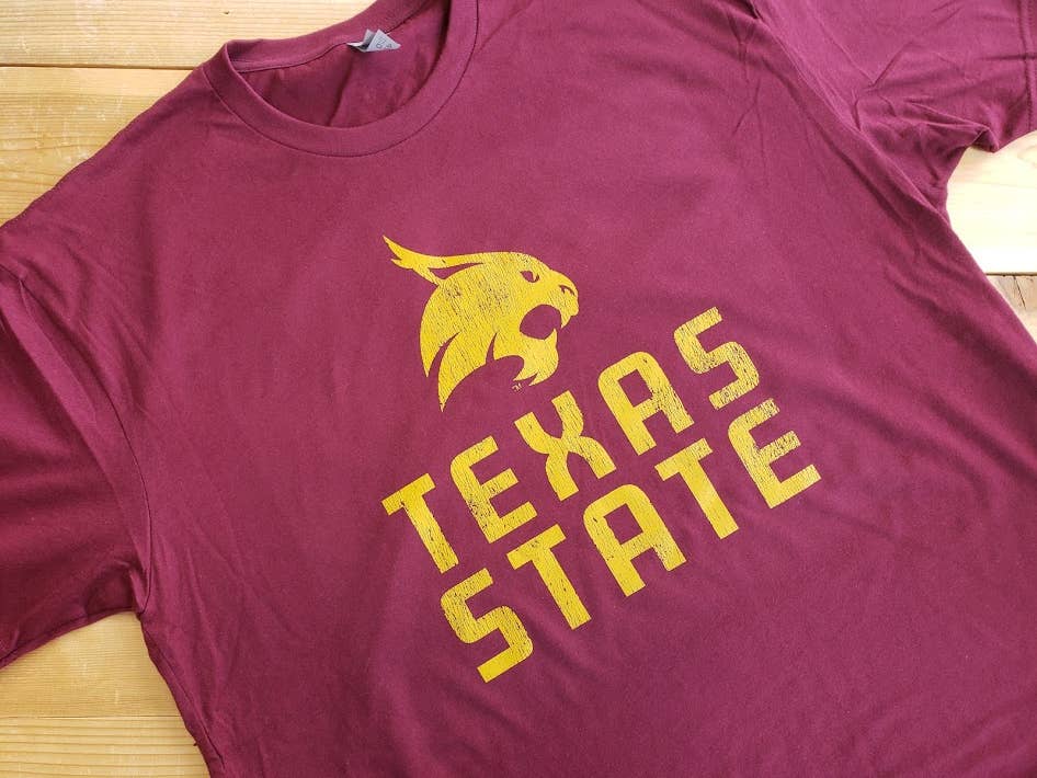 Texas State Univeristy Stacked Logo T-shirt (Gold on Maroon)